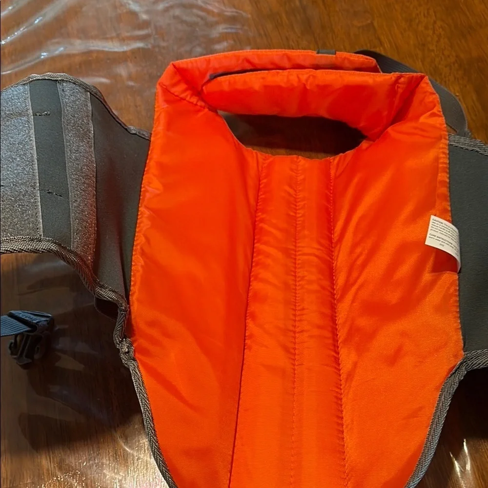 Orange Life Jacket with Black Straps